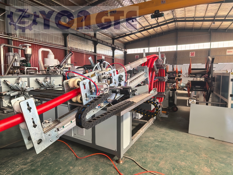 آلة اللف المطورة ذاتيًا لشركة Yongte Plastic Machinery تحل معضلة اللف لأنابيب PE ذات القطر الكبير