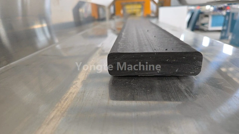 stacker of plastic lumber panel making machine